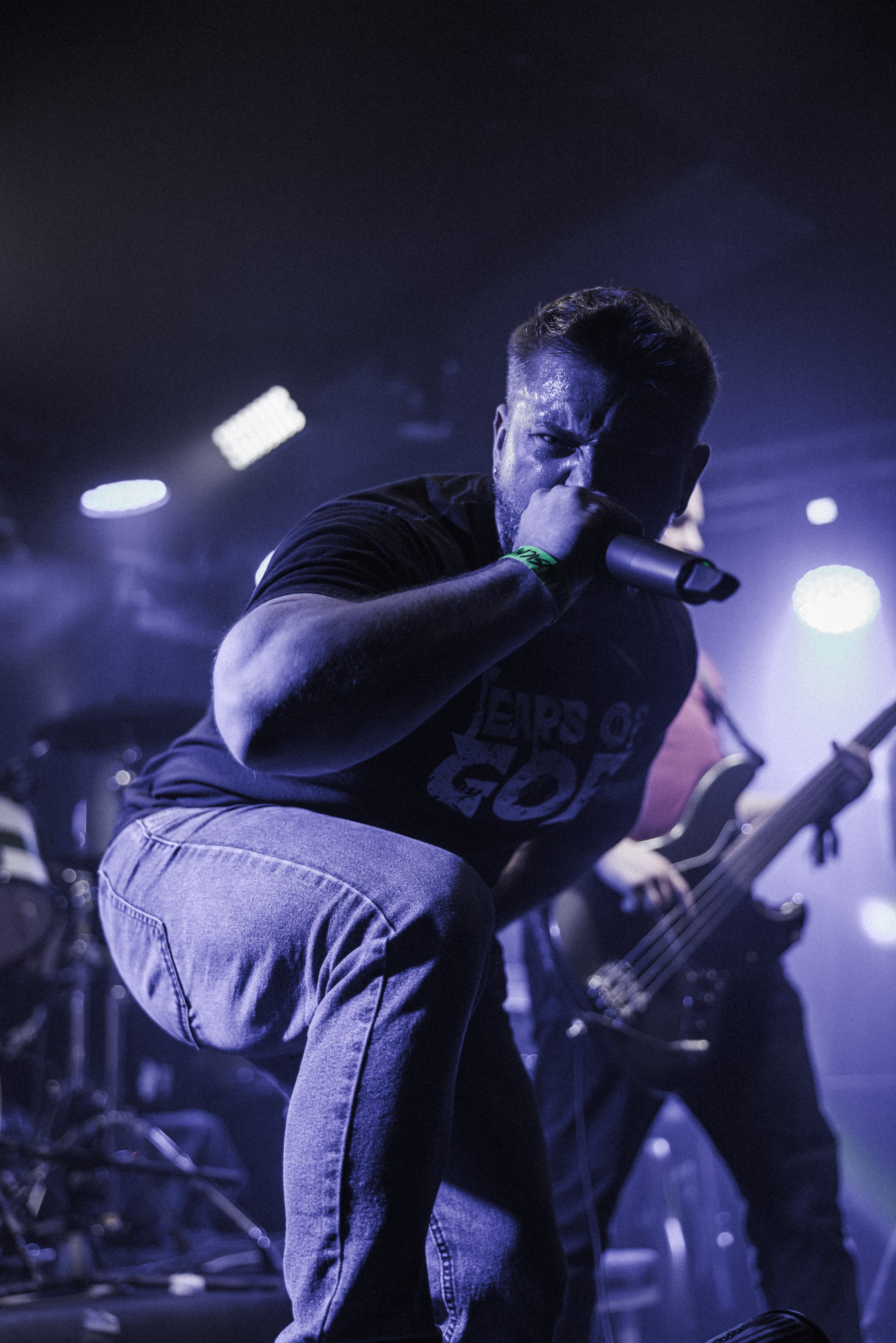 Tears of God vocalist performing live on stage
